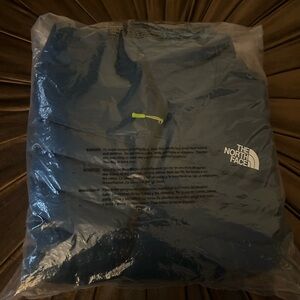 The North Face Men's Midnight Petrol With White Logo Rolls Into Carry Pouch